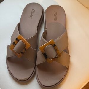 OluKai Women's La’i tan Slide Sandals with Tortoise Buckle